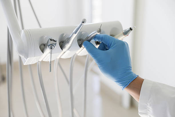 Professional Tooth Extraction technician working in Stow, OH